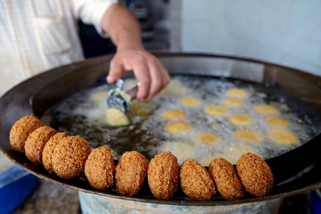 Falafel frying in oil